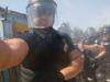 Во время столкновений на Осокорках полиция применила газ против журналиста Associated Press