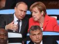 Путин и Меракель пообщались на стадионе