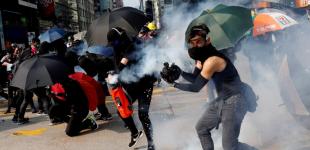Гонконг, Баку, Сантьяго, Барселона: хвиля масових протестів у фото