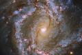 Hubble заснял спиральную галактику с супермассивной черной дырой