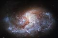 Hubble показал спиральную галактику в созвездии Печь