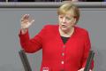 Мир больше не должен рассчитывать на лидерство США - Меркель