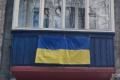 Обіцяють перефарбувати балкон: у Києві помітили російський триколор