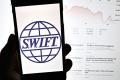 Повернення Росії в SWIFT: навіщо це Путіну та чи реально зняти санкції