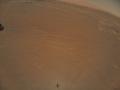 Мини-вертолет сделал снимок марсохода NASA на Красной планете