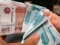 Российский рубль рекордно обвалился на фоне санкций США 