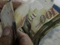 Сотрудник израильского банка заработал нервный срыв при подсчете миллиарда шекелей