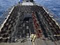 Военный крейсер США задержал судно с партией российского оружия