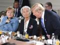Трамп на саммите G7 бросил в сторону Меркель конфеты 