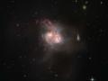 NASA показало слияние двух галактик