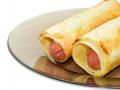 Сосиски із сиром у лаваші в духовці: рецепт домашнього фастфуду