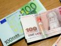 Латвия перейдет на евро через 11 месяцев