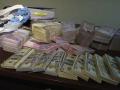 Правоохранители изъяли $3,5 млн и 7 млн гривен в пунктах нелегального обмена валют в Киеве