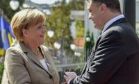 Порошенко обсудил с Меркель прекращение огня в зоне АТО