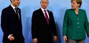 Макрон и Меркель поговорили с Путиным об Украине