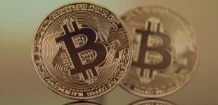 Инвесторы массово меняют Bitcoin на золото