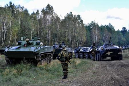 Боевики выдвинули за линии отвода сотни танков, орудий и артсистем 