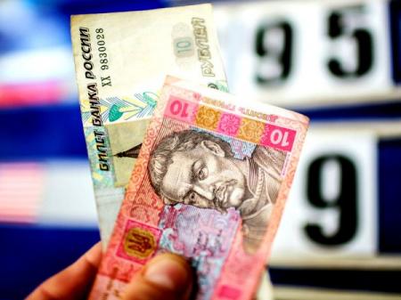 Московская биржа прекращает торги валютной парой рубль-гривна