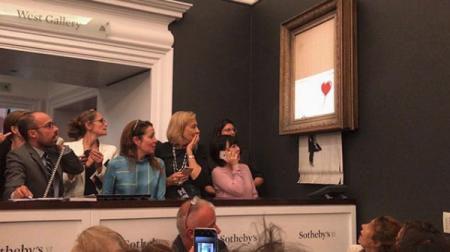 Картина Бэнкси самоуничтожилась сразу после ее покупки за $1,3 млн 